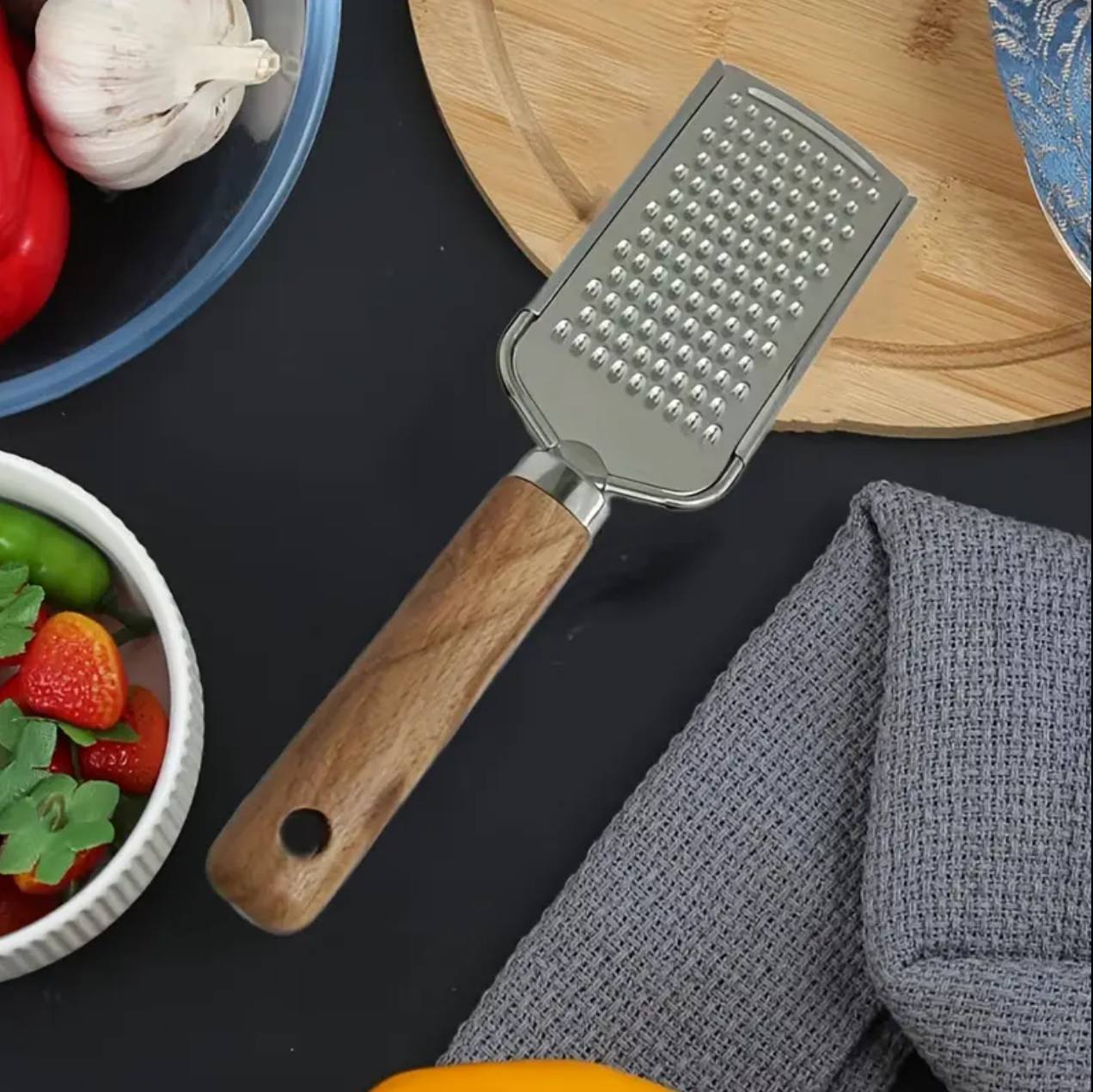 Stainless steel multipurpose grater
With wooden handle