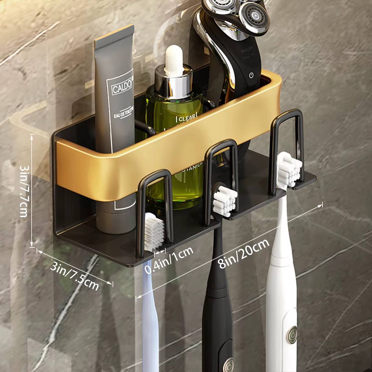 Metallic wall mounted toothbrush/paste holder.