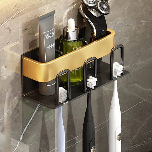 Metallic wall mounted toothbrush/paste holder.