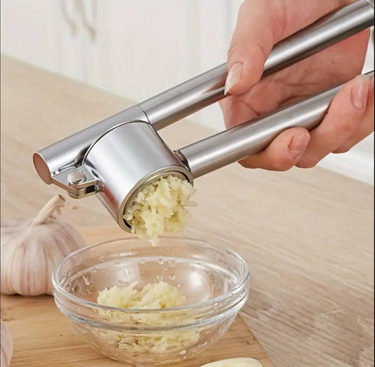 Stainless steel garlic crusher