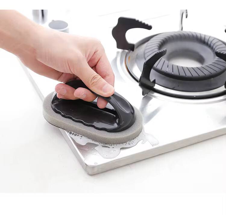 Scrubbing Kitchen Sponge .
