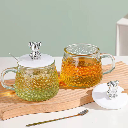 High borosilicate cup with lid/spoon.