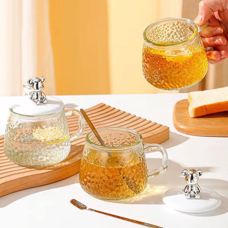 High borosilicate cup with lid/spoon.