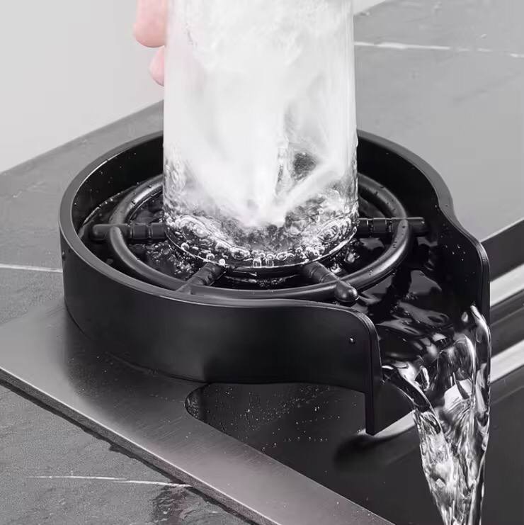Automatic cup washer.