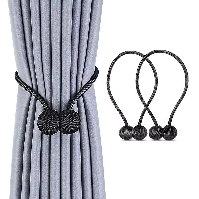 Magnetic tieback curtain holder