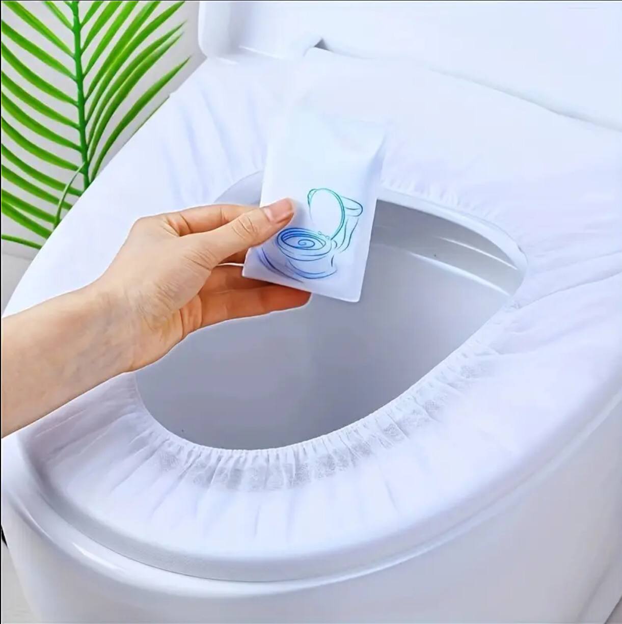 Disposable toilet seat cover .