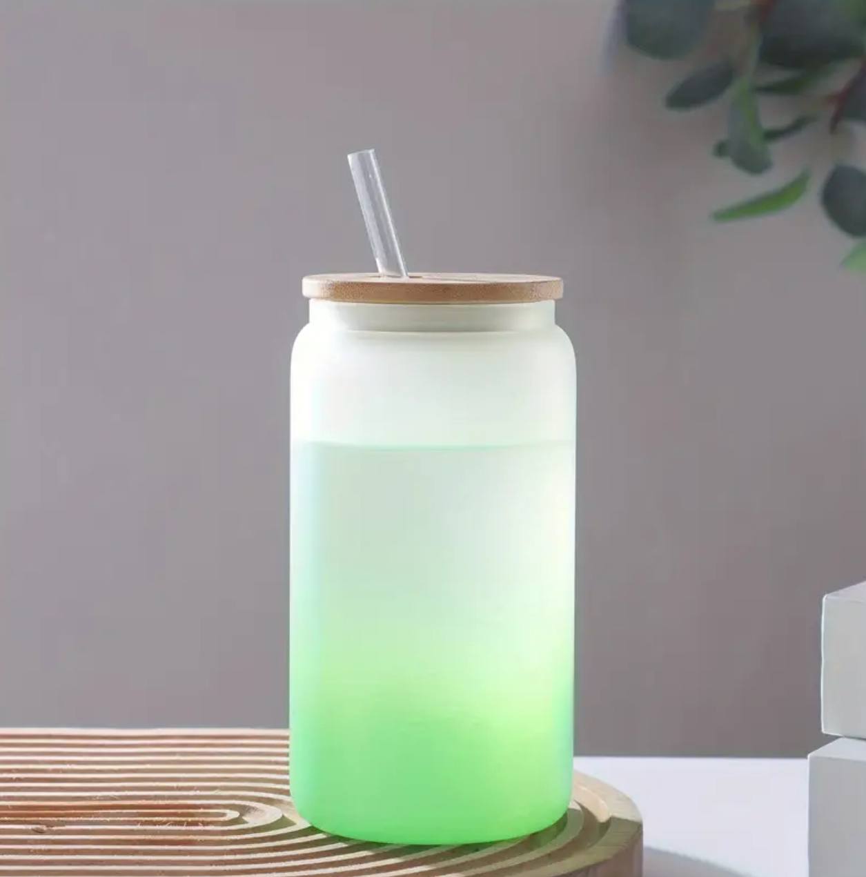 Frosted glass cup with clear glass straw