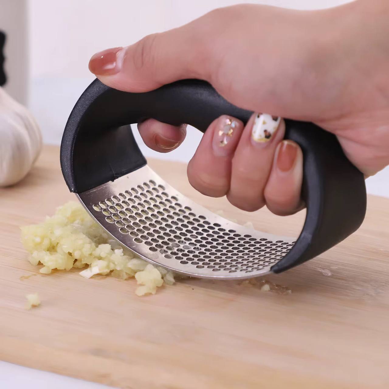 Ring Garlic crusher press .