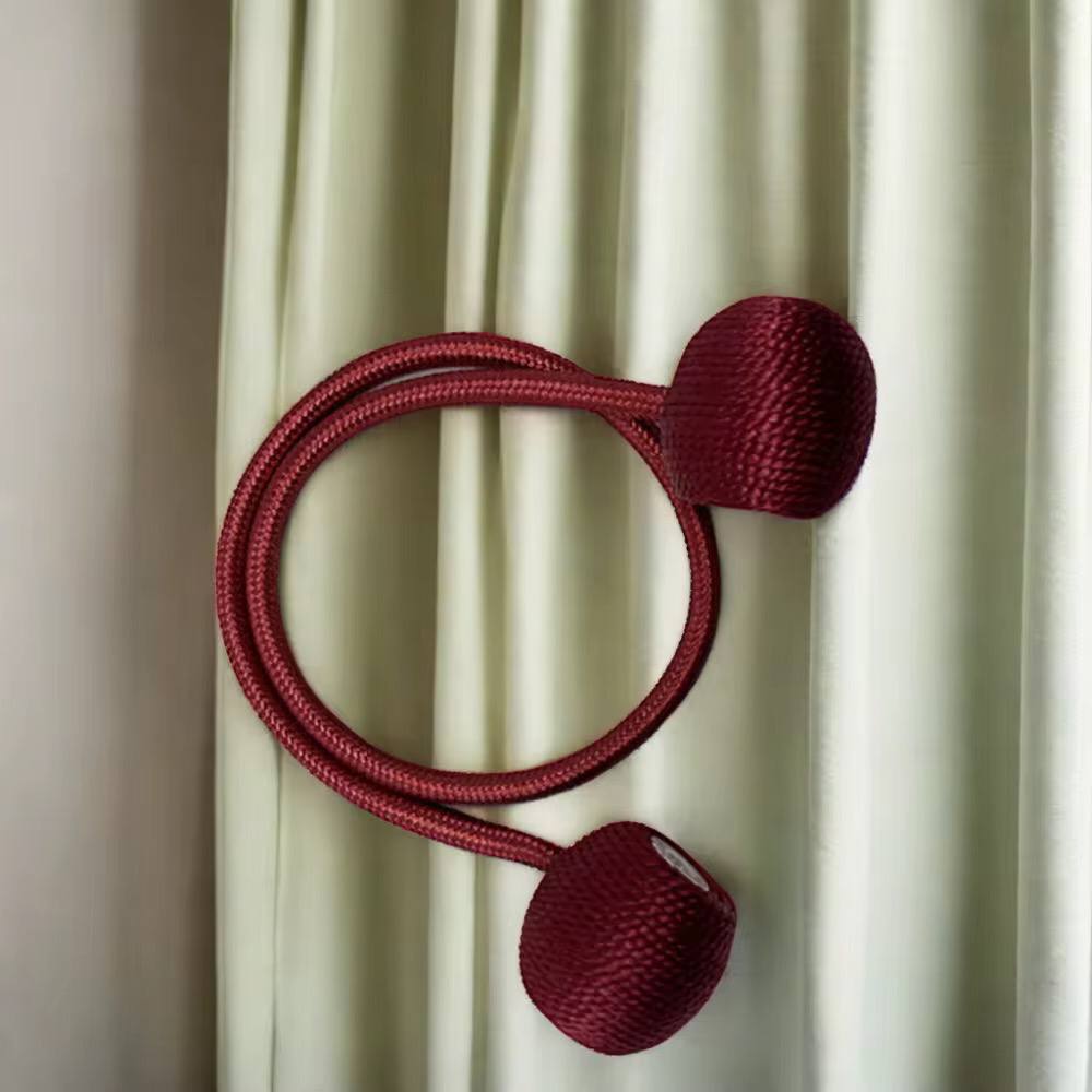 Magnetic curtain holders