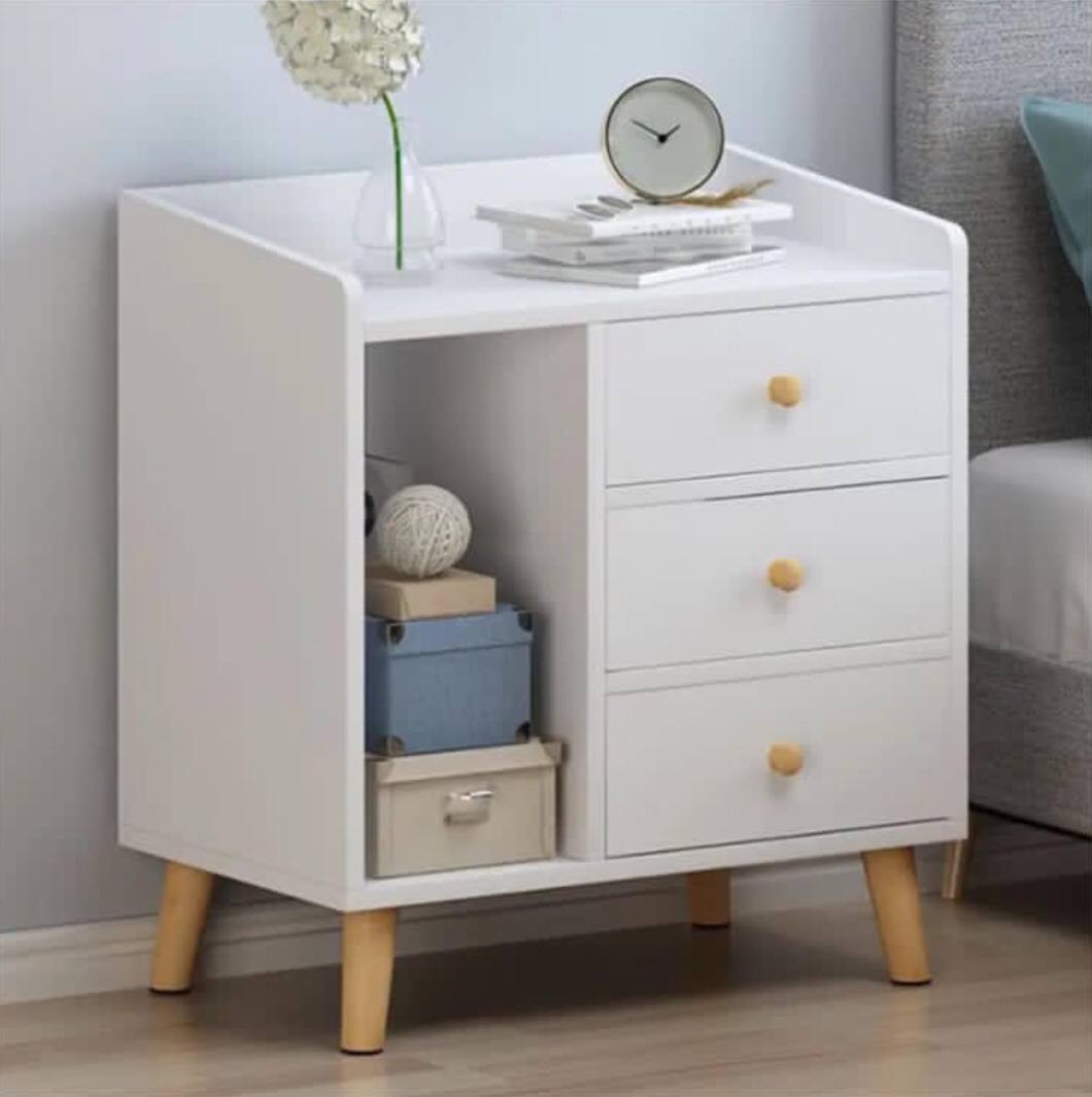 Bedside table with 3 drawers.