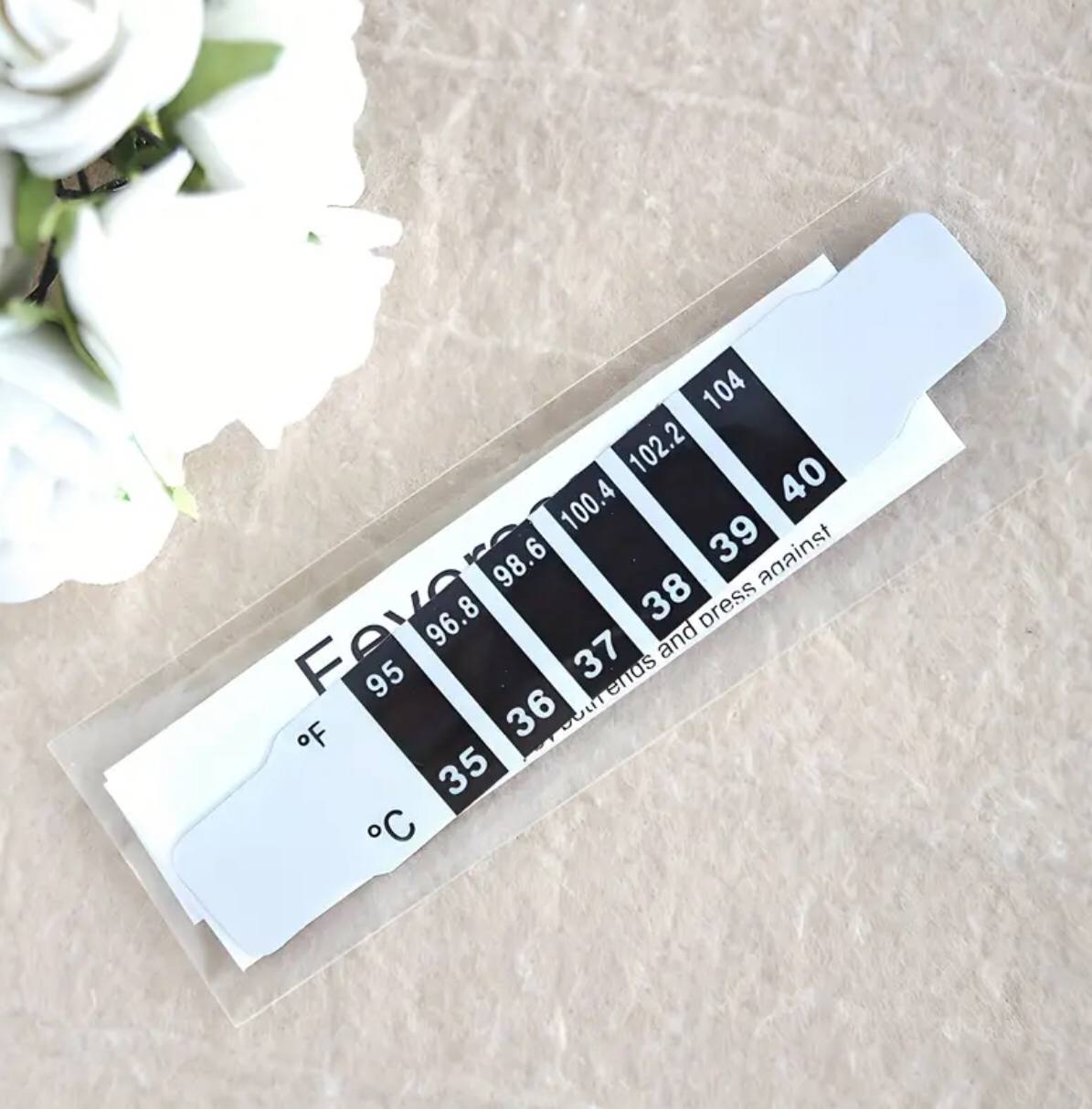 Forehead strip thermometer.