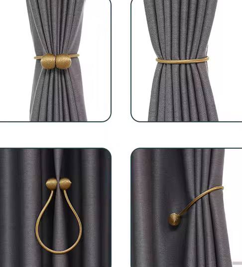 Magnetic curtain holders