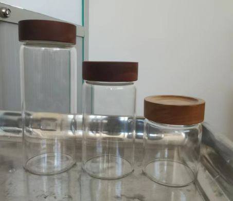 Mulit-purpose Modern Glass Sealed storage Jars with Acacia wood lid and Spoons