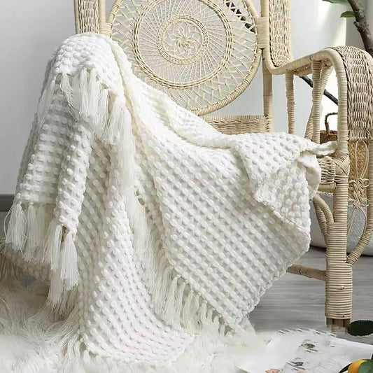 Knitted throw blanket