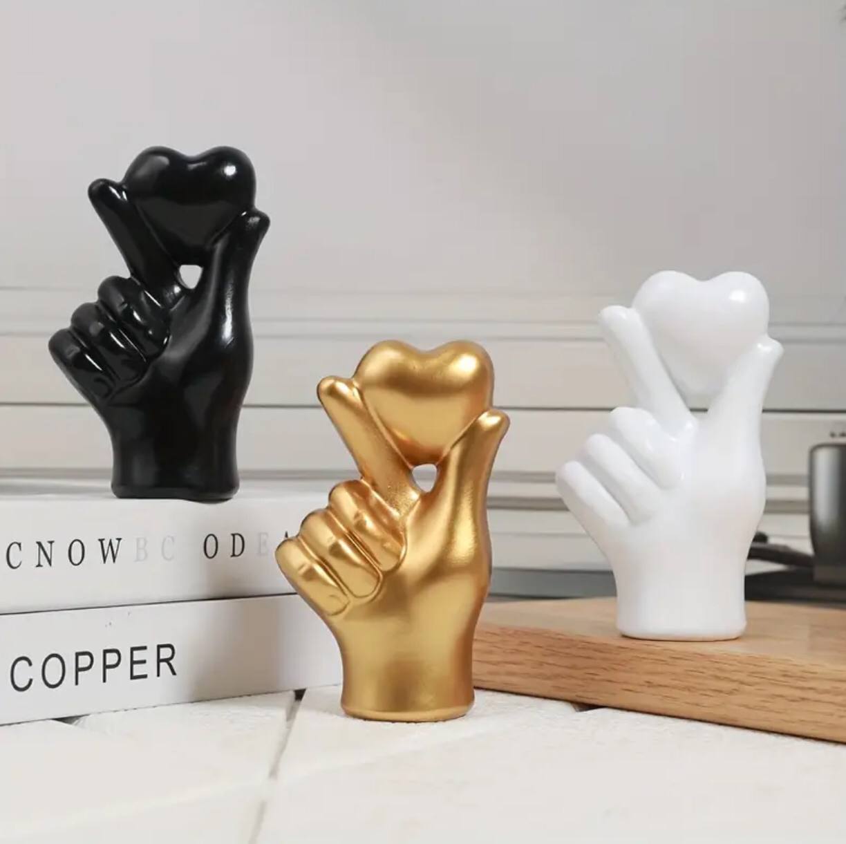 Heart hand gesture decor statue