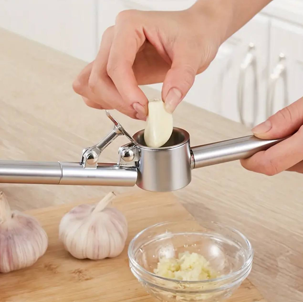 Stainless steel garlic crusher