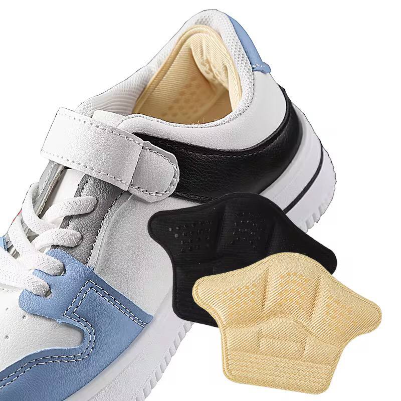 Shoe adjust size heel pad a pair .