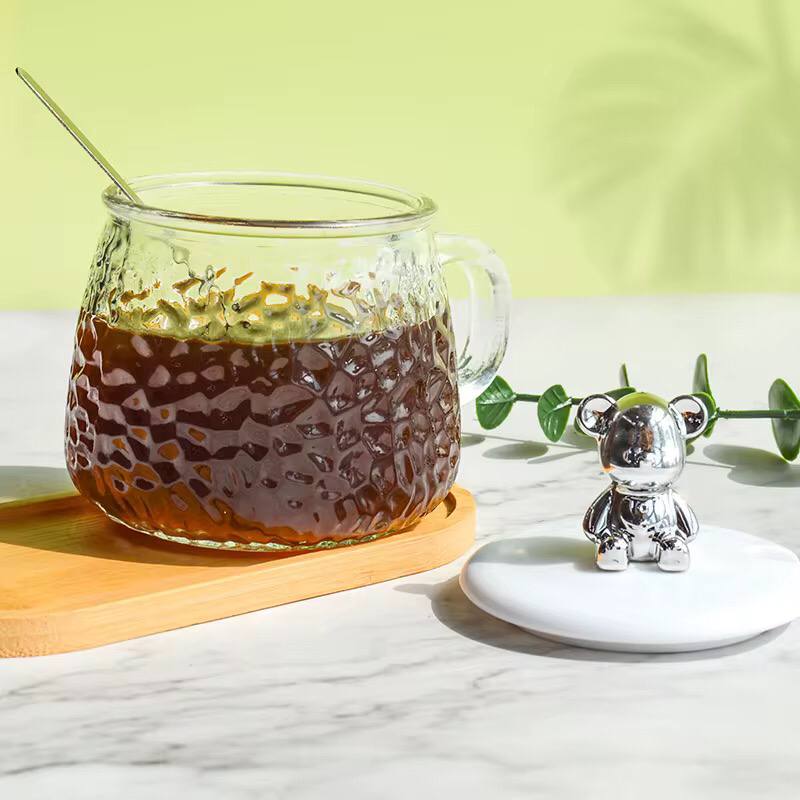 High borosilicate cup with lid/spoon.