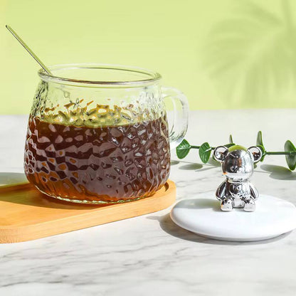 High borosilicate cup with lid/spoon.