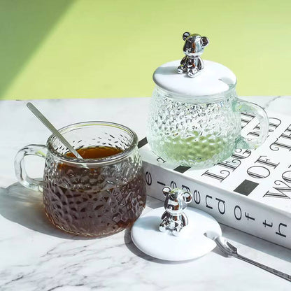 High borosilicate cup with lid/spoon.