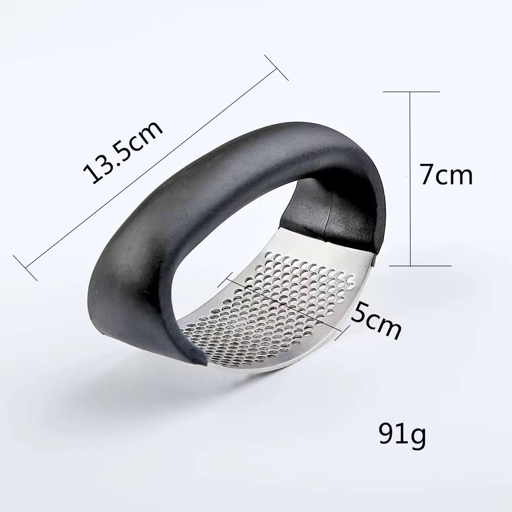 Stainless steel garlic press crusher.