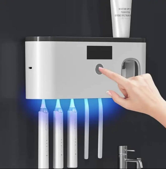 Electric toothbrush UV sterilizerilizarion dispenser