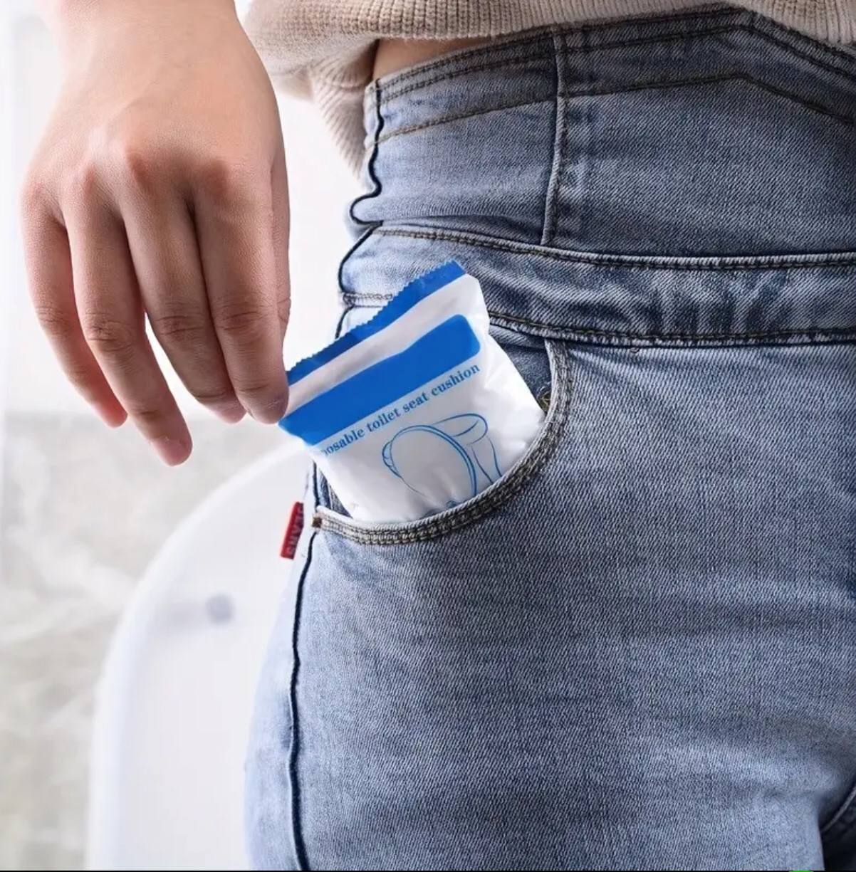 Disposable toilet seat cover .