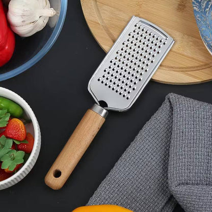 Stainless steel multipurpose grater 
With wooden handle
