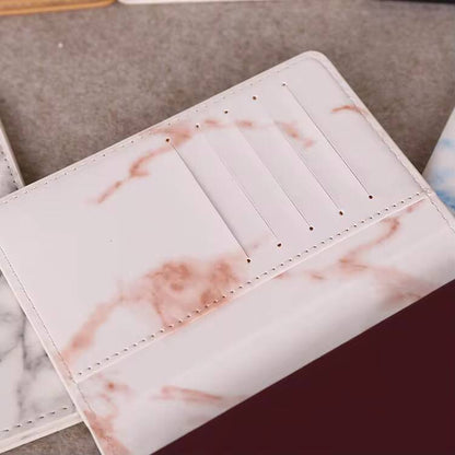 Pu leather passport cover with marble effect.