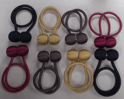 Magnetic curtain holders