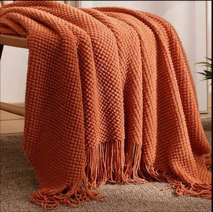Knitted throw blanket