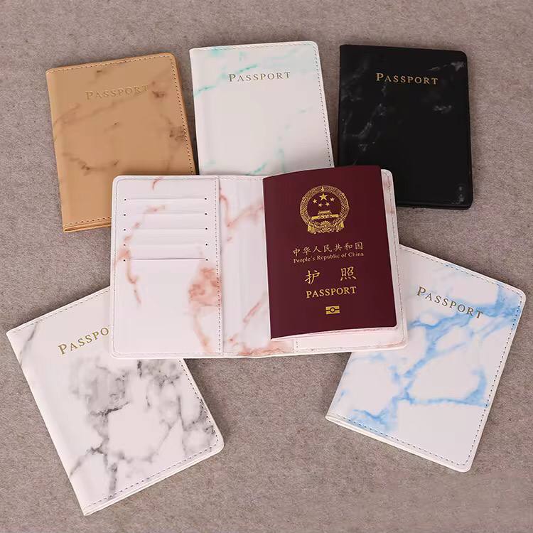 Pu leather passport cover with marble effect.