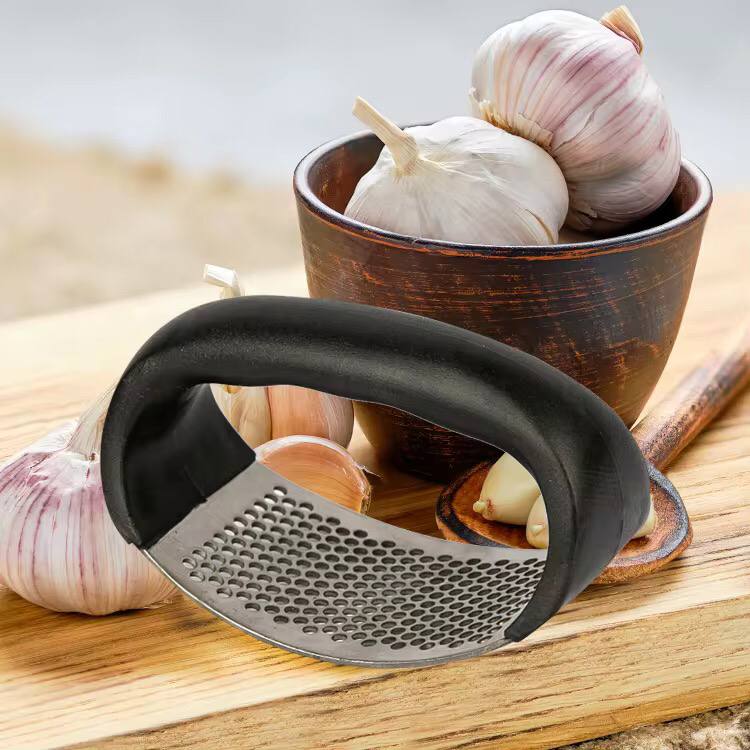 Ring Garlic crusher press .