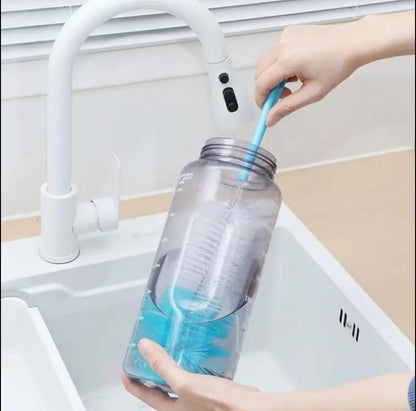 Long handled cleaning brush bottle with an end sponge