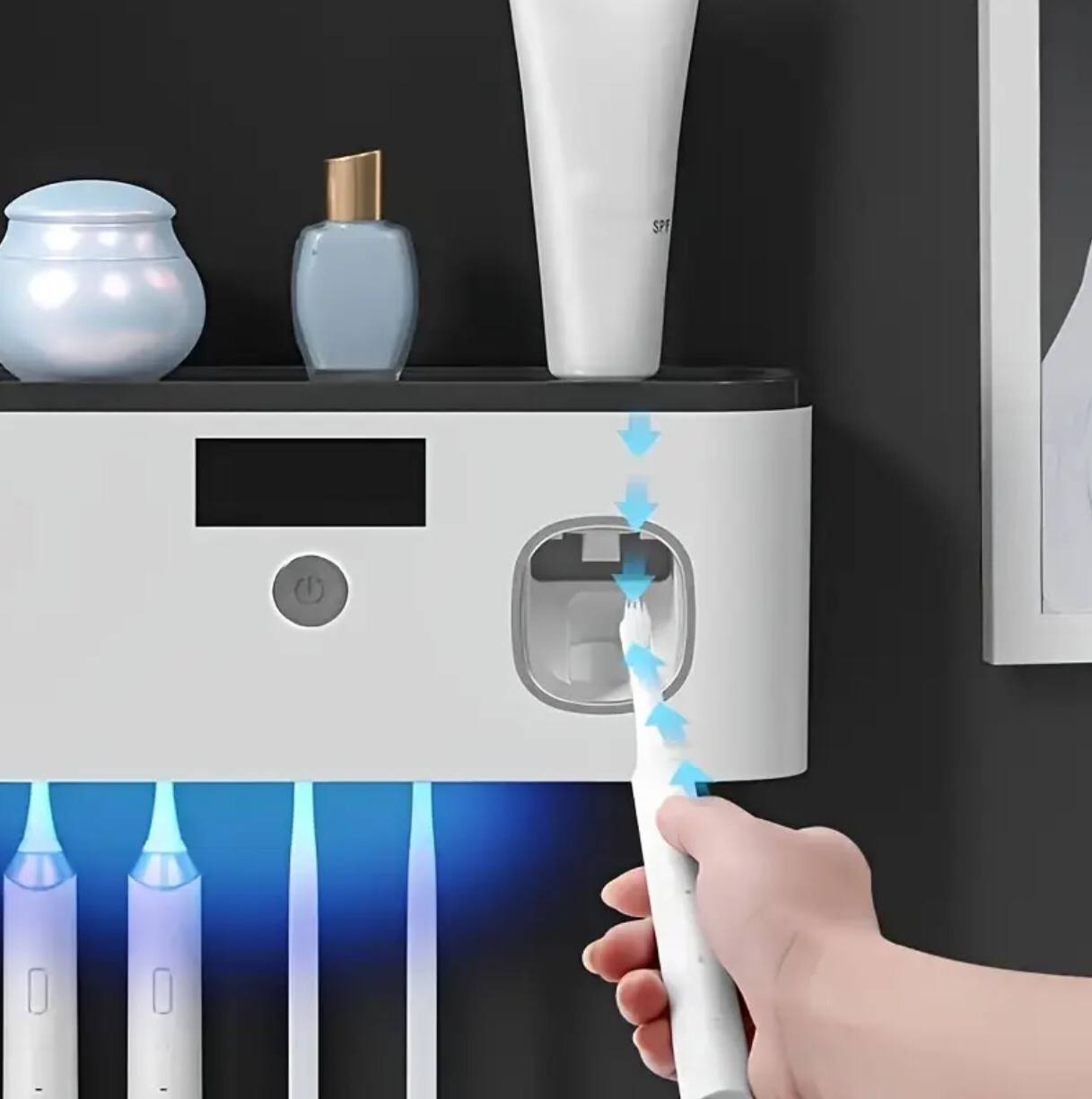 Electric toothbrush UV sterilizerilizarion dispenser