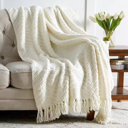 Textured knitted heavy throw blanket with tassels