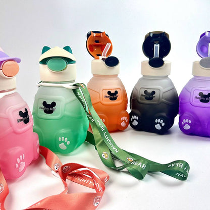 Adorable bear-shaped bottle with a stylish hat or headphone design, sturdy build, and matching strap.