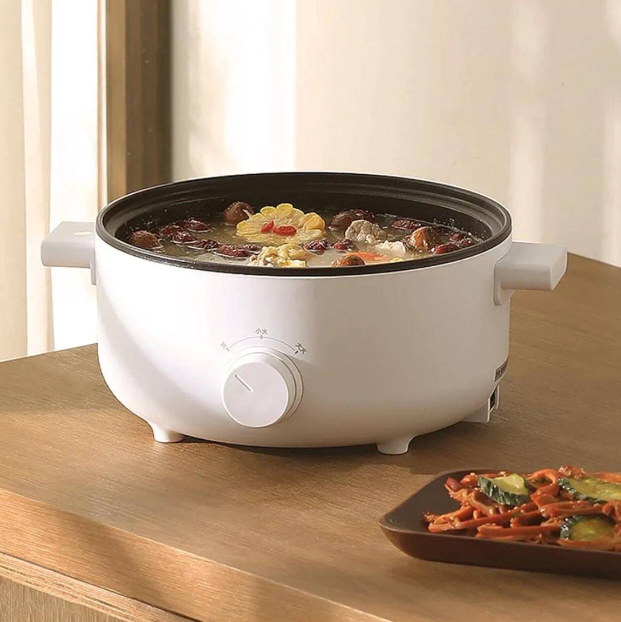 Multiple purposes electric cooker