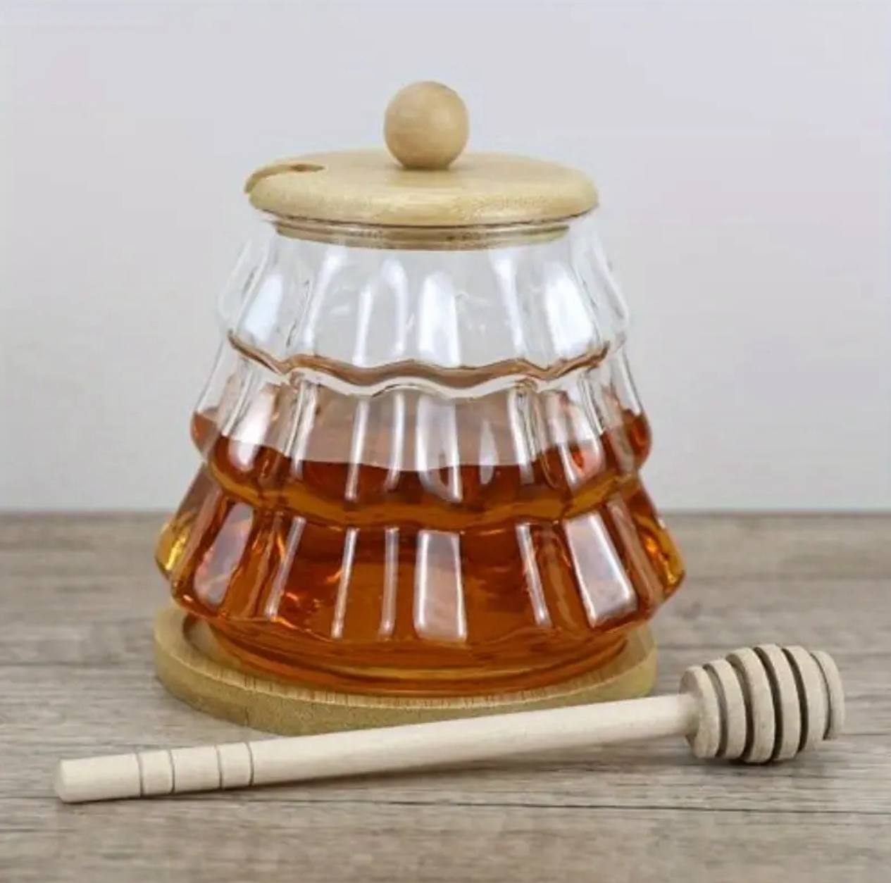 Borosilicate beehive honey jar with wooden lid and stirring stick