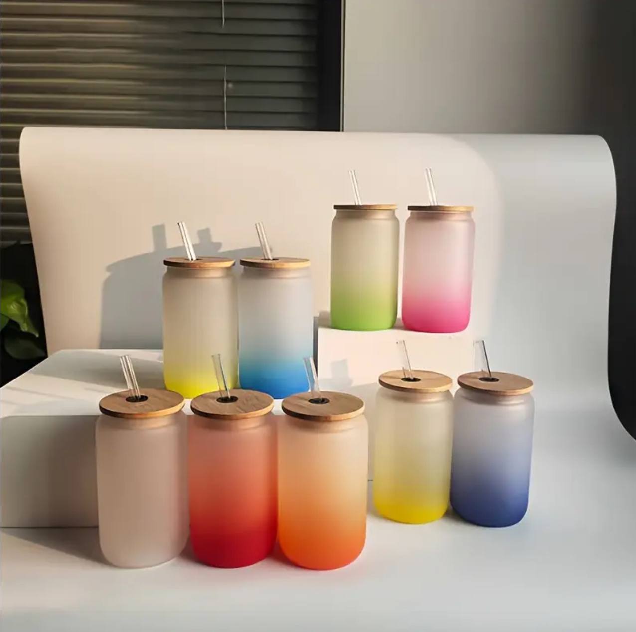 Frosted glass cup with clear glass straw