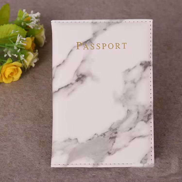 Pu leather passport cover with marble effect.