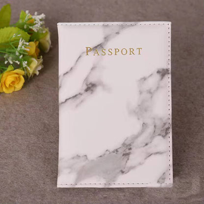 Pu leather passport cover with marble effect.