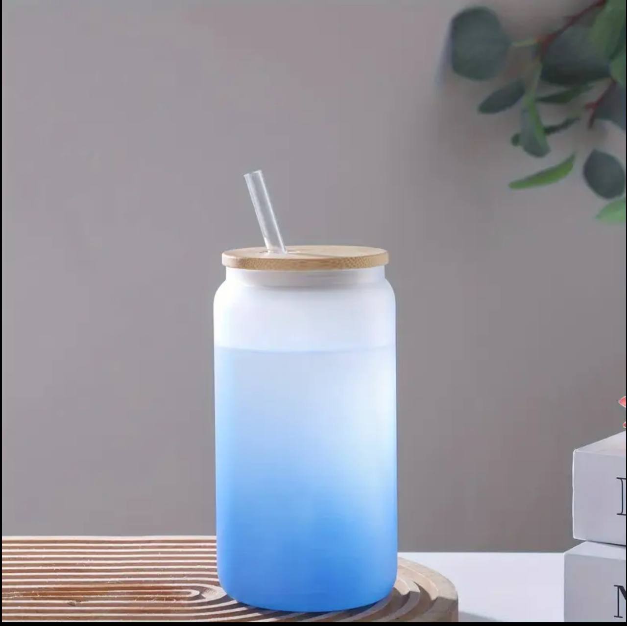 Frosted glass cup with clear glass straw
