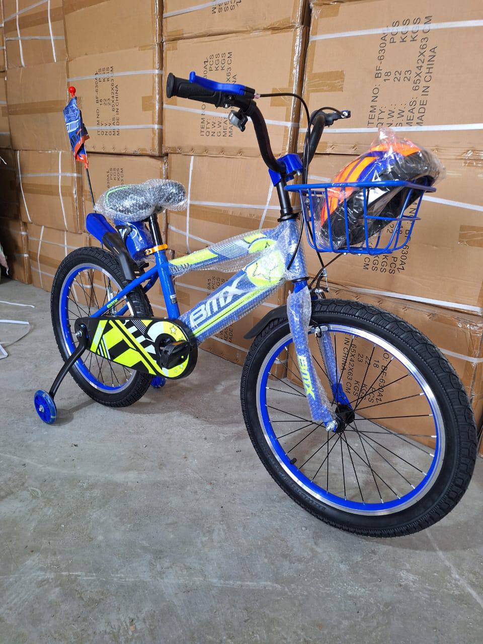 BMX Kids bicycles size 20 blue and red plus helmet