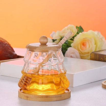 Borosilicate beehive honey jar with wooden lid and stirring stick
