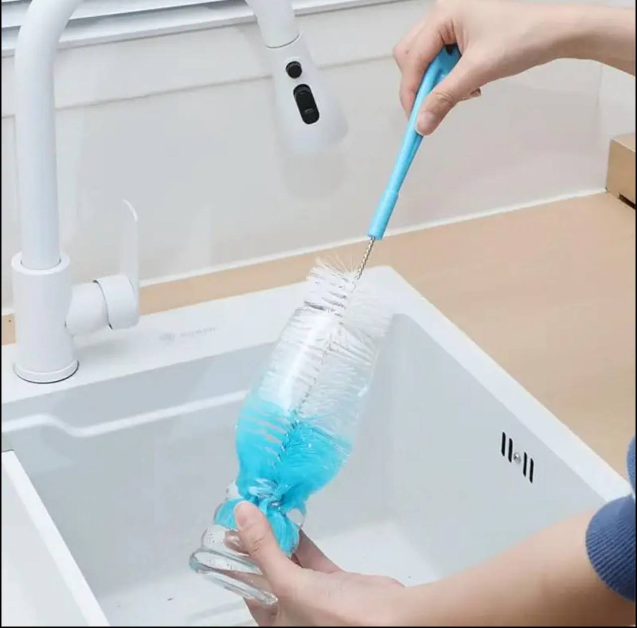 Long handled cleaning brush bottle with an end sponge