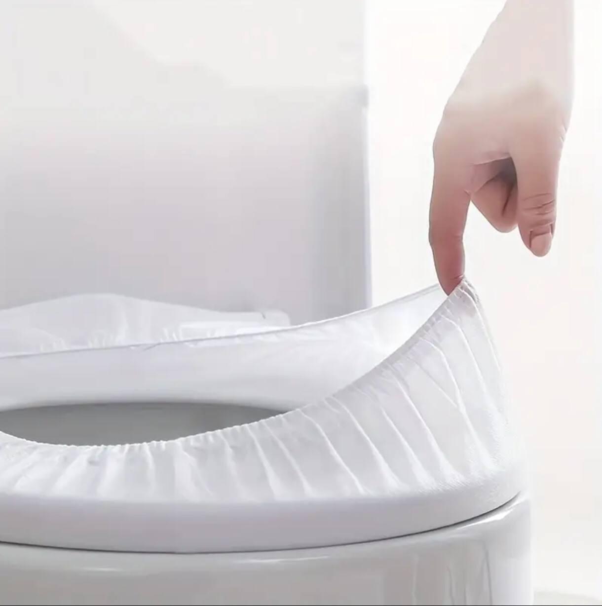 Disposable toilet seat cover .