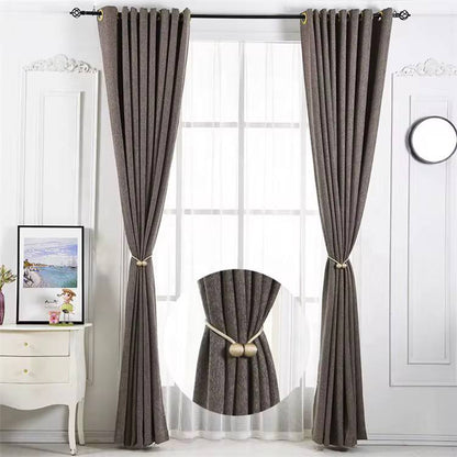 Magnetic tieback curtain holder
