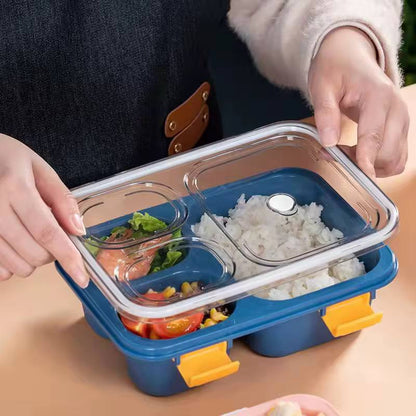 Partioned lunch/snack box with a spoon